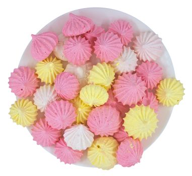 French vanilla meringue cookies on the dish isolated on white. Clipping path included.