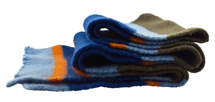 Blue knitted scarf folded isolated on white background. Clipping path included.