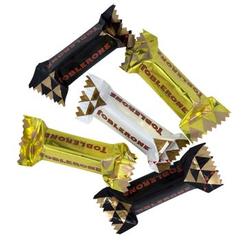 PARIS, FRANCE - MAY 18, 2015: A bar of mini Toblerone - Swiss white, milk and dark chocolate with honey and almond nougat isolated on a white background. Made by Kraft Foods. Clipping path included.

Paris, France - May 18, 2015: A bar of mini Toblerone - Swiss white, milk and dark chocolate with honey and almond nougat isolated on a white background. Made by Kraft Foods. Clipping path included.