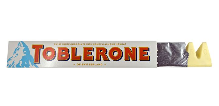 PARIS, FRANCE - MAY 18, 2015: A bar of Toblerone - Swiss white chocolate with honey and almond nougat isolated on a white background. Made by Kraft Foods. Clipping path included.

Paris, France - May 18, 2015: A bar of mini Toblerone - Swiss white chocolate with honey and almond nougat isolated on a white background. Made by Kraft Foods. Clipping path included.