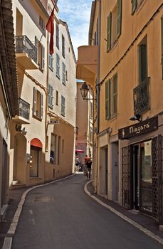 SAINT TROPEZ, FRANCE - JUNE 5, 2014: Architecture of Saint Tropez city in French Riviera, France.

Saint Tropez, France - June 5, 2014: Architecture of Saint Tropez city in French Riviera, France. People are walking by street.