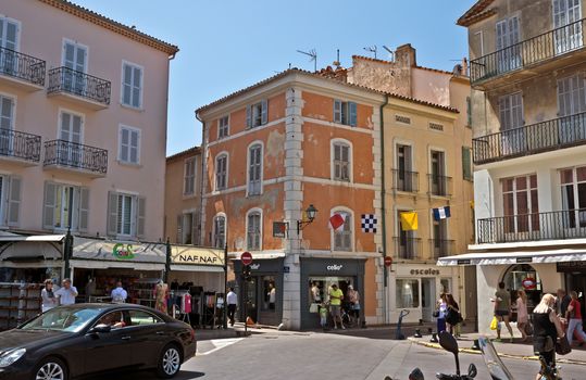 SAINT TROPEZ, FRANCE - JUNE 5, 2014: Architecture of Saint Tropez city in French Riviera, France.

Saint Tropez, France - June 5, 2014: Architecture of Saint Tropez city in French Riviera, France. People are walking by street.