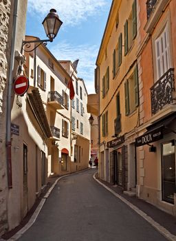 SAINT TROPEZ, FRANCE - JUNE 5, 2014: Architecture of Saint Tropez city in French Riviera, France.

Saint Tropez, France - June 5, 2014: Architecture of Saint Tropez city in French Riviera, France. People are walking by street.