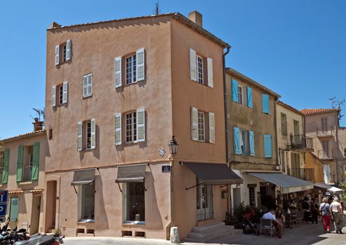 SAINT TROPEZ, FRANCE - JUNE 5, 2014: Architecture of Saint Tropez city in French Riviera, France.

Saint Tropez, France - June 5, 2014: Architecture of Saint Tropez city in French Riviera, France. People are walking by street.