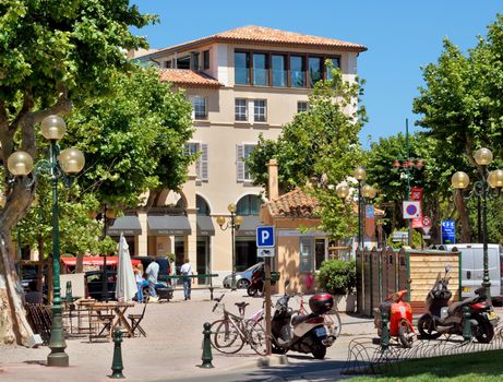 SAINT TROPEZ, FRANCE - JUNE 5, 2014: Architecture of Saint Tropez city in French Riviera, France.

Saint Tropez, France - June 5, 2014: Architecture of Saint Tropez city in French Riviera, France. People are walking by street.