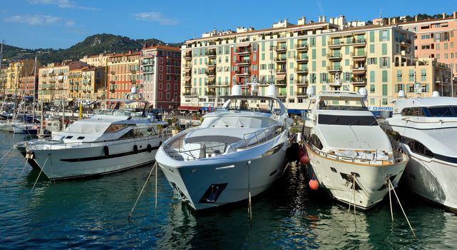 NICE, FRANCE - JUNE 5, 2014: Yachts in the Port de Nice in French Riviera. Port de Nice was started in 1745.

Nice, France - June 5, 2014: Yachts in the Port de Nice in French Riviera. Port de Nice was started in 1745.