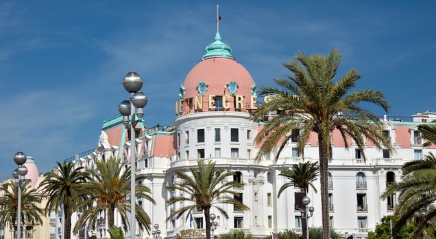 NICE, FRANCE - JUNE 6, 2014: Luxury Hotel Negresco on English Promenade in Nice, French Riviera. Hotel Negresco is the famous luxury hotel on the Promenade des Anglais in Nice.

Nice, France - June 6, 2014: Luxury Hotel Negresco on English Promenade in Nice, French Riviera. Hotel Negresco is the famous luxury hotel on the Promenade des Anglais in Nice, a symbol of the Cote d'Azur.