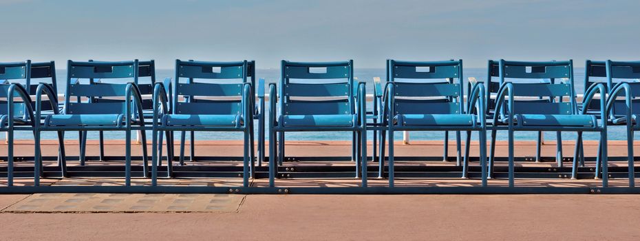 Deck Chairs in front of the sea, Nice, France.