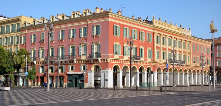 NICE, FRANCE - JUNE 8, 2014: Architecture of the Place Massena. Square is located in the city center and is the most popular destination among tourists. The square was reconstructed in 1979.

Nice, France - June 8, 2014: Architecture of the Place Massena. Square is located in the city center and is the most popular destination among tourists. The square was reconstructed in 1979. There are many boutiques, cafes and restaurants.