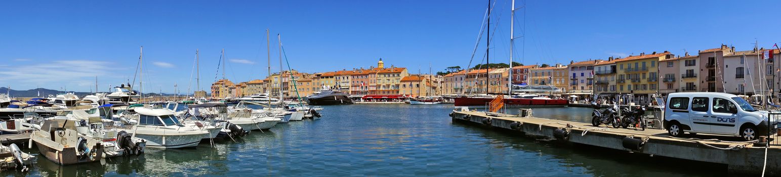 SAINT TROPEZ, FRANCE - JUNE 5, 2014: Panoramic view of the city of Saint Tropez. An overview of the glamorous city of Saint Tropez on the cote d'azur.

Saint Tropez, France - June 5, 2014: Panoramic view of the city of Saint Tropez. An overview of the glamorous city of Saint Tropez on the cote d'azur. People are walking by street.