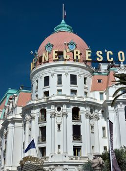 NICE, FRANCE - JUNE 6, 2014: Luxury Hotel Negresco on English Promenade in Nice, French Riviera. Hotel Negresco is the famous luxury hotel on the Promenade des Anglais in Nice.

Nice, France - June 6, 2014: Luxury Hotel Negresco on English Promenade in Nice, French Riviera. Hotel Negresco is the famous luxury hotel on the Promenade des Anglais in Nice, a symbol of the Cote d'Azur.