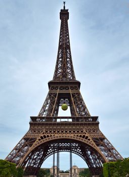 PARIS, FRANCE - JUNE 9, 2014: Eiffel Tower. The Eiffel tower is the most visited monument of Paris.

Paris, France - June 9, 2014: Eiffel Tower. The Eiffel tower is the most visited monument of Paris.