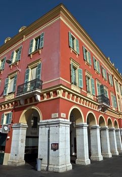NICE, FRANCE - JUNE 8, 2014: Architecture of the Place Massena. Square is located in the city center and is the most popular destination among tourists. The square was reconstructed in 1979.

Nice, France - June 8, 2014: Architecture of the Place Massena. Square is located in the city center and is the most popular destination among tourists. The square was reconstructed in 1979. There are many boutiques, cafes and restaurants.