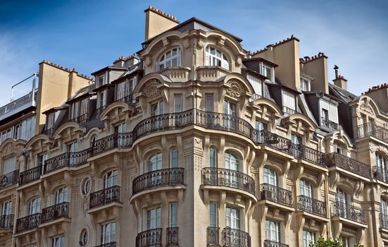 PARIS, FRANCE - JUNE 11, 2014: View of the typical french architecture.

Paris, France - June 11, 2014: View of the typical french architecture.