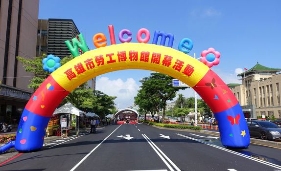 KAOHSIUNG, TAIWAN -- JULY 25, 2015: An inflatable welcome arch marks the entrance to the opening ceremony for the new Kaohsiung Museum of Labor.