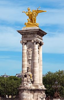 Pillar of bridge "Pont Alexandre III". Pont Alexandre III is an arch famous bridge that spans Seine, connecting Champs-Elysees quarter and Invalides. It is a historical monument. Paris, France.