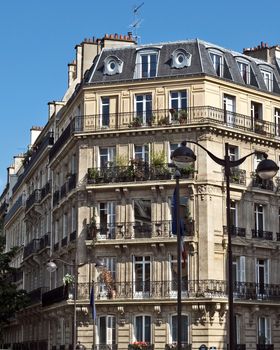 PARIS, FRANCE - JUNE 11, 2014: View of the parisian architecture on the Left Bank.

Paris, France - June 11, 2014: View of the parisian architecture on the Left Bank.