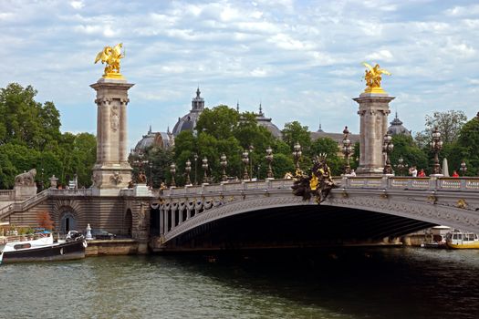 Pont Alexandre III, Paris, France. The bridge, with its Art Nouveau lamps, cherubs, nymphs and winged horses at either end, was built between 1896 and 1900.

PARIS, FRANCE - JUNE 9: Pont Alexandre III on June 9, 2014 in Paris, France. The bridge, with its Art Nouveau lamps, cherubs, nymphs and winged horses at either end, was built between 1896 and 1900.

Paris, France - June 9, 2014: Pont Alexandre III. The bridge, with its Art Nouveau lamps, cherubs, nymphs and winged horses at either end, was built between 1896 and 1900.