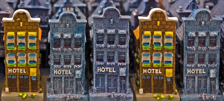Souvenir houses in shop of Amsterdam Schiphol airport.