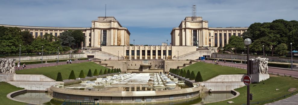 PARIS, FRANCE - JUNE 11, 2014: Palace - Palais de Chaillot. Was built in 1937 on a Hill of Trocadero.

Paris, France - June 11, 2014: Palace - Palais de Chaillot. Was built in 1937 on a Hill of Trocadero. People are walking on outdoors.