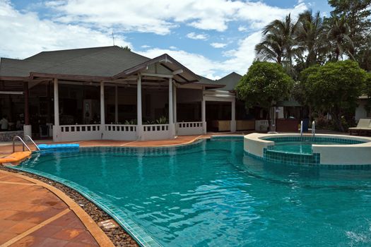 Luxury swimming pool in the tropical hotel.