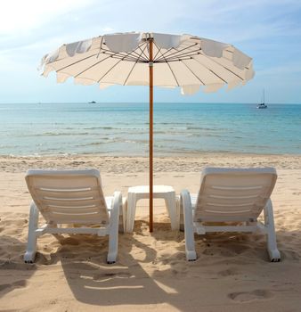 White Sandy Beach with Loungers and Umbrellas in Koh Samui, Thailand