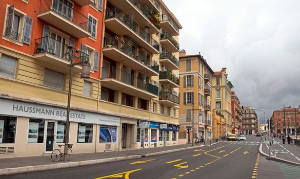 NICE, FRANCE - APRIL 27: Architecture along Promenade des Anglais on April 27, 2013 in Nice, France. It is a symbol of the Cote d'Azur and was built in 1830 at the expense of the British colony.

Nice, France - April 27, 2013: Architecture along Promenade des Anglais. Promenade des Anglais is a symbol of the Cote d'Azur and was built in 1830 at the expense of the British colony.