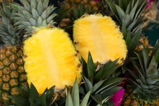 Two slices of pineapples on the street market. 