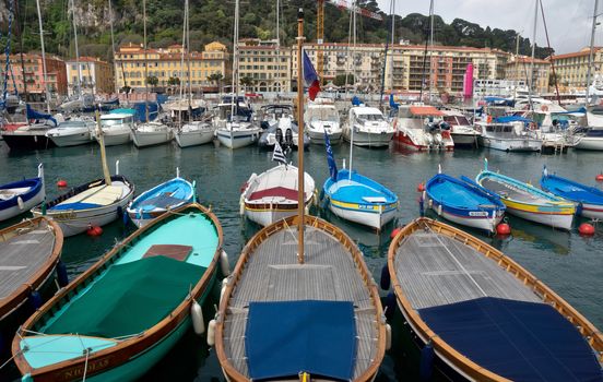 NICE, FRANCE - APRIL 27: Colorful boats in the Port de Nice on April 27, 2013 in Nice, France. Port de Nice was started in 1745.

Nice, France - April 27, 2013: Colorful boats in the Port de Nice in French Riviera. Port de Nice was started in 1745.