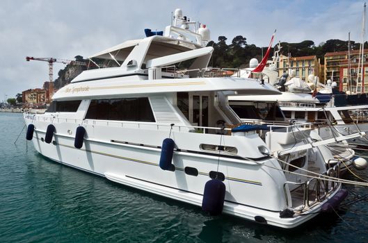 NICE, FRANCE - APRIL 27: A luxury yacht in the port of Port de Nice on April 27, 2013 in Nice, France. Port de Nice was started in 1745.

Nice, France - April 27, 2013: A luxury yacht in the port of Port de Nice in French Riviera. Port de Nice was started in 1745.