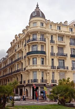 NICE, FRANCE - APRIL 27: Architecture along Promenade des Anglais on April 27, 2013 in Nice, France. It is a symbol of the Cote d'Azur and was built in 1830 at the expense of the British colony.

Nice, France - April 27, 2013: Architecture along Promenade des Anglais. Promenade des Anglais is a symbol of the Cote d'Azur and was built in 1830 at the expense of the British colony.