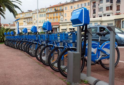 NICE, FRANCE - APRIL 27: Public Bicycles Sharing Station on April 27, 2013 in Nice, France. One of 120 stations in Nice. This service offers over 1200 self-service bicycles.

Public Bicycles Sharing Station in Nice, France

Nice, France - April 27, 2013: Row of public bikes for rent along the street. Nice has 120 stations. This service offers over 1200 self-service bicycles.