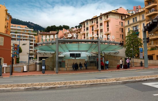 MONTE CARLO, MONACO - APRIL 28: The train station Monaco-Ville of Monaco on April 28, 2013 in Monte Carlo, Monaco. There are no airports in Monaco and the only way to get there is by railroad, roads or the sea.

Monte Carlo, Monaco - April 28, 2013: The train station Monaco-Ville of Monaco. People are waiting for the arrival of transport. There are no airports in Monaco and the only way to get there is by railroad, roads or the sea.