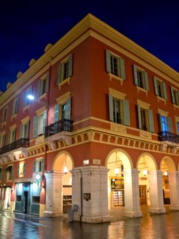 NICE, FRANCE - APRIL 28: Architecture of Place Massena at night on April 28, 2013 in Nice, France. The square was reconstructed in 1979. 

Nice, France - April 28, 2013: Architecture of Place Massena at night. The square was reconstructed in 1979.