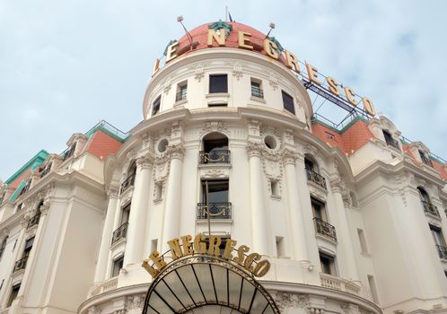 NICE, FRANCE - APRIL 27: Luxury Hotel Negresco on April 27, 2013 in Nice, France. Hotel Negresco is the famous luxury hotel on the Promenade des Anglais in Nice, a symbol of the Cote d'Azur.

Nice, France - April 27, 2013: Luxury Hotel Negresco on English Promenade in Nice, French Riviera. Hotel Negresco is the famous luxury hotel on the Promenade des Anglais in Nice, a symbol of the Cote d'Azur.
