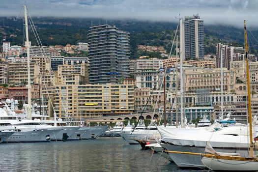 MONTE CARLO, MONACO - APRIL 28: Fashionable yachts in the port Hercules on April 28, 2013 in Monte Carlo, Monaco. 

Monte Carlo, Monaco - April 28, 2013: Fashionable yachts in the port Hercules