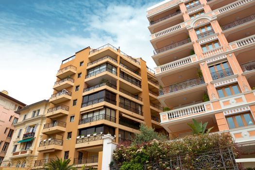 MONTE CARLO, MONACO - APRIL 28: Architecture of residential buildings on April 28, 2013 in Monte Carlo, Monaco. All residential buildings in Monaco is very expensive and fashionable.

Monte Carlo, Monaco - April 28, 2013: Architecture of residential buildings. All residential buildings in Monaco is very expensive and fashionable.