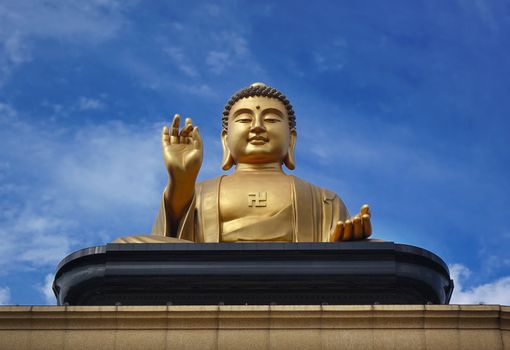 KAOHSIUNG, TAIWAN -- JANUARY 25, 2020: A giant Buddha statue overlooks the Fo Guang Shan Buddhist complex.