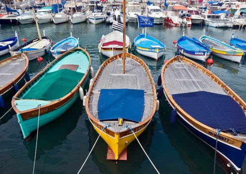 NICE, FRANCE - APRIL 27: Colorful boats in the Port de Nice on April 27, 2013 in Nice, France. Port de Nice was started in 1745.

Nice, France - April 27, 2013: Colorful boats in the Port de Nice in French Riviera. Port de Nice was started in 1745.