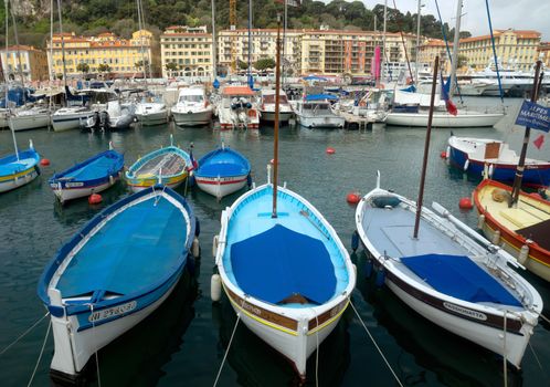 NICE, FRANCE - APRIL 27: Colorful boats in the Port de Nice on April 27, 2013 in Nice, France. Port de Nice was started in 1745.

Nice, France - April 27, 2013: Colorful boats in the Port de Nice in French Riviera. Port de Nice was started in 1745.