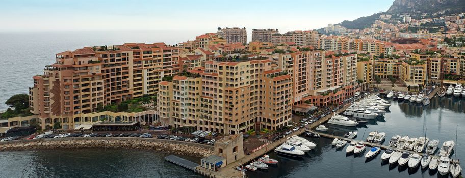 MONTE CARLO, MONACO - APRIL 28: Architecture Fontvieille district on April 28, 2013 in Monte Carlo, Monaco. Lands for the district have been reclaimed from the sea.

Monte Carlo, Monaco - April 28, 2013: Architecture Fontvieille district.  Lands for the district have been reclaimed from the sea.