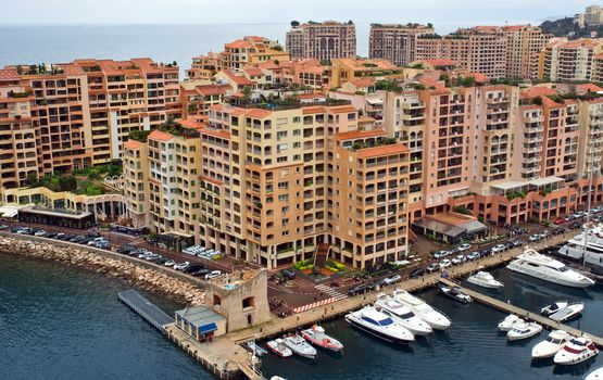 MONTE CARLO, MONACO - APRIL 28: Architecture Fontvieille district on April 28, 2013 in Monte Carlo, Monaco. Lands for the district have been reclaimed from the sea.

Monte Carlo, Monaco - April 28, 2013: Architecture Fontvieille district.  Lands for the district have been reclaimed from the sea.