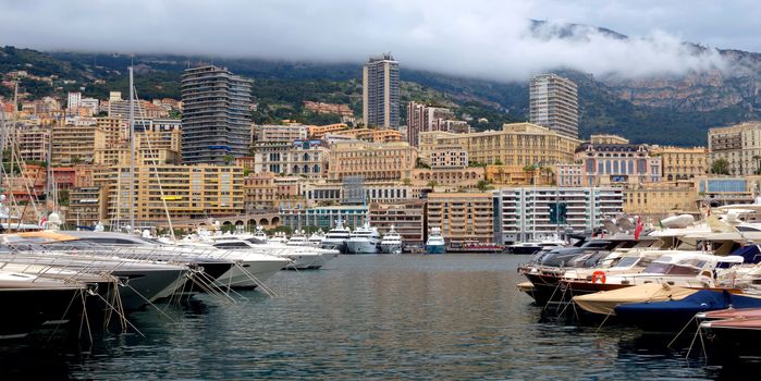MONTE CARLO, MONACO - APRIL 28: Fashionable yachts in the port Hercules on April 28, 2013 in Monte Carlo, Monaco. 

Monte Carlo, Monaco - April 28, 2013: Fashionable yachts in the port Hercules.