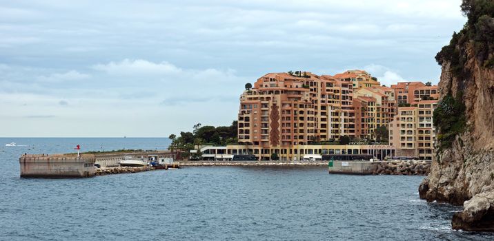 MONTE CARLO, MONACO - APRIL 28: Architecture Fontvieille district on April 28, 2013 in Monaco. Lands for the district have been reclaimed from the sea.

Monte Carlo, Monaco - April 28, 2013: Architecture Fontvieille district.  Lands for the district have been reclaimed from the sea.