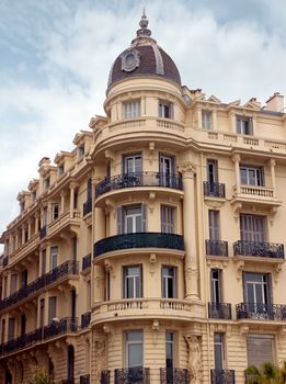 NICE, FRANCE - APRIL 27: Architecture along Promenade des Anglais on April 27, 2013 in Nice, France. It is a symbol of the Cote d'Azur and was built in 1830 at the expense of the British colony.

Nice, France - April 27, 2013: Architecture along Promenade des Anglais. Promenade des Anglais is a symbol of the Cote d'Azur and was built in 1830 at the expense of the British colony.
