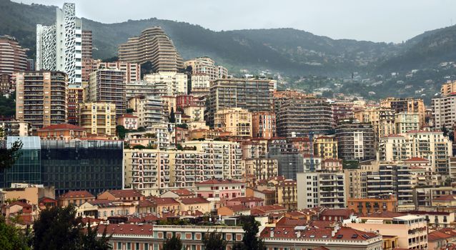 MONTE CARLO, MONACO - APRIL 28: Architecture of residential buildings on April 28, 2013 in Monte Carlo, Monaco. All residential buildings in Monaco is very expensive and fashionable.

Monte Carlo, Monaco - April 28, 2013: Architecture of residential buildings. All residential buildings in Monaco is very expensive and fashionable.