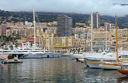 MONTE CARLO, MONACO - APRIL 28: Fashionable yachts in the port Hercules on April 28, 2013 in Monte Carlo, Monaco. 

Monte Carlo, Monaco - April 28, 2013: Fashionable yachts in the port Hercules.