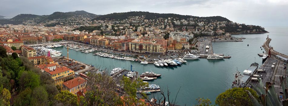 NICE, FRANCE - APRIL 29: Panoramic view of Port de Nice on April 29, 2013 in Nice, France. Port de Nice was started in 1745.

Nice, France - April 29, 2013: Panoramic view of Port de Nice in French Riviera. Port de Nice was started in 1745.