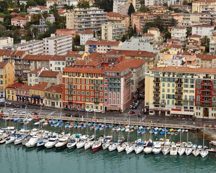 NICE, FRANCE - APRIL 29: View of Port de Nice on April 29, 2013 in Nice, France. Port de Nice was started in 1745.

Nice, France - April 29, 2013: View of Port de Nice in French Riviera. Port de Nice was started in 1745.