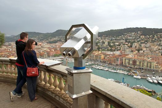 NICE - APRIL 29: Binoculars view city of Nice on April 29, 2013 in Nice, France. It is luxury resort of French riviera.